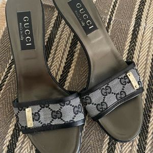 Ladies Gucci slip-on sandals.  Barely worn, if at all.